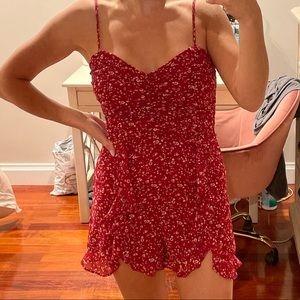 Storia floral romper size small